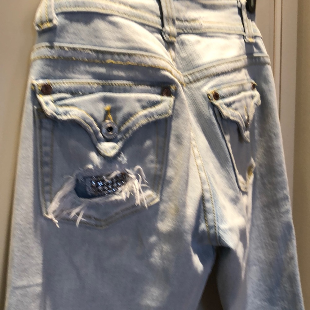 Worn out jeans w/ crystal and tear accent